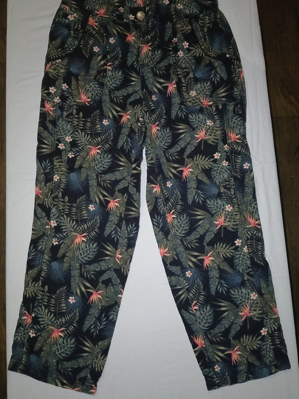 intro. Black Tropical Print Pants with Green Leaves & Coral Accents